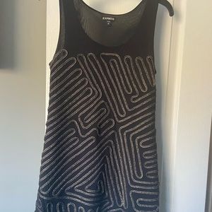 Express mini dress with gold detail design on front. Size M